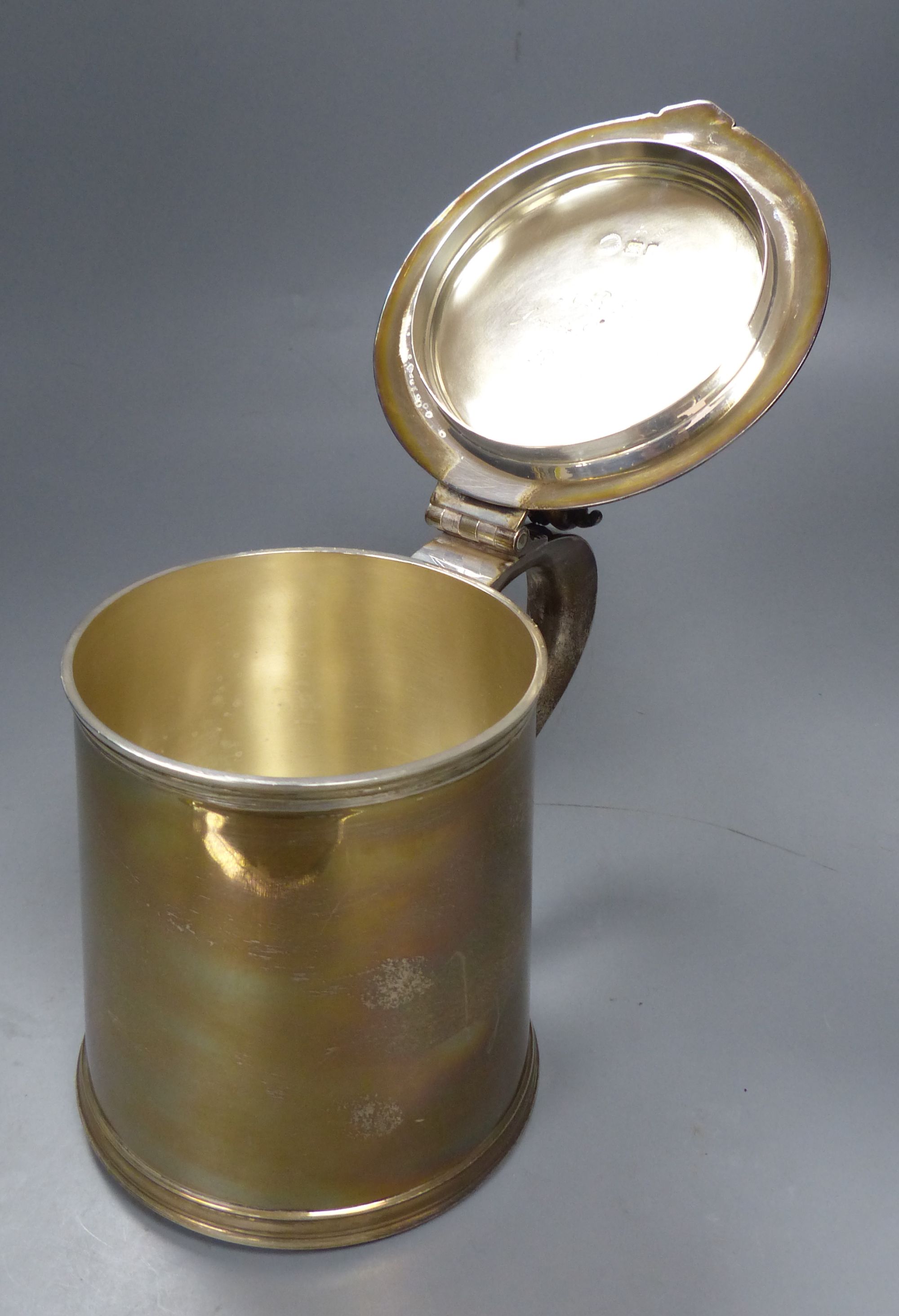 A 1930s 17th century style silver tankard by C. Shapland & Co, London, 1934, height 16.5cm, 30oz.